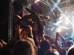 music festival fair musician indie rock band crowd surf marketing
